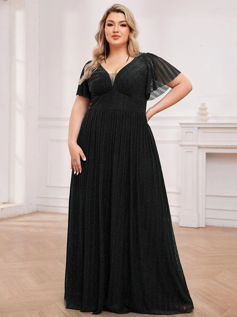 Robe de soirée transparente scintillante col en V taille empire manches courtes