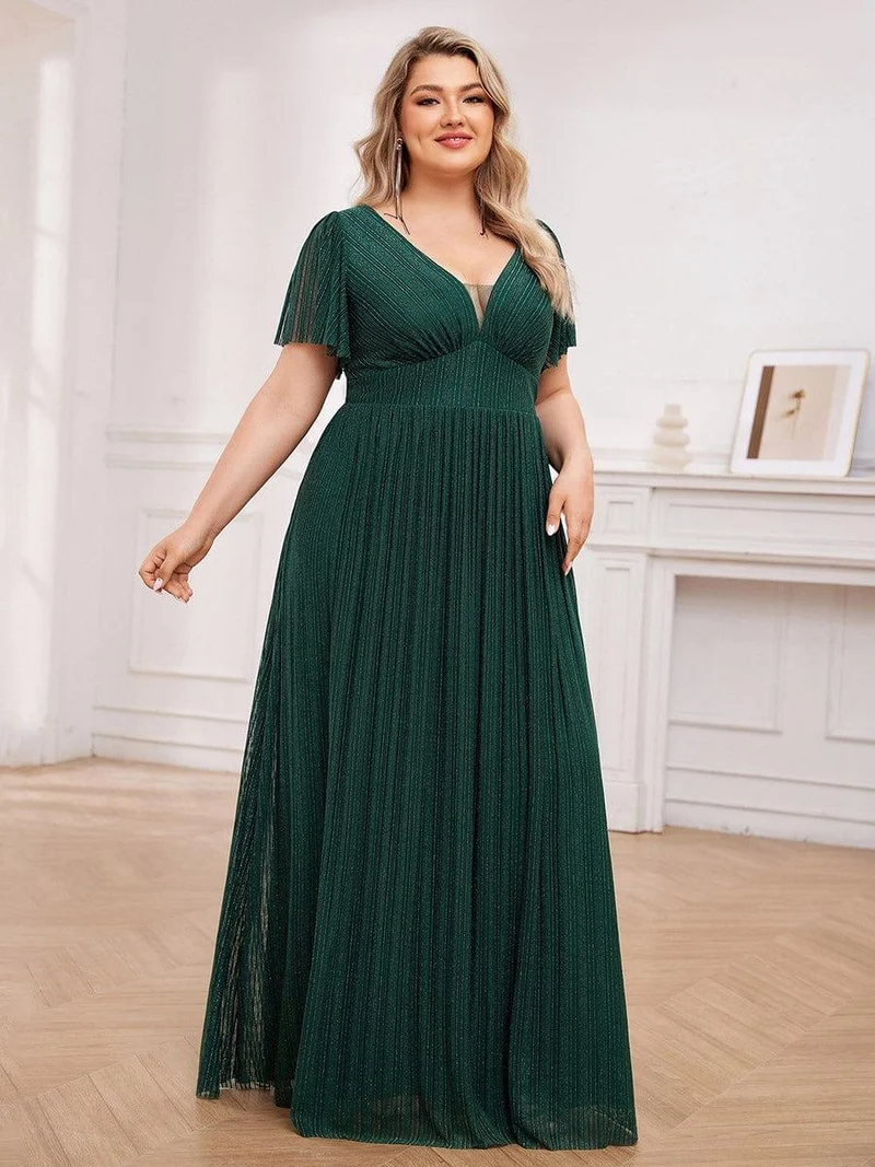 Robe de soirée transparente scintillante col en V taille empire manches courtes