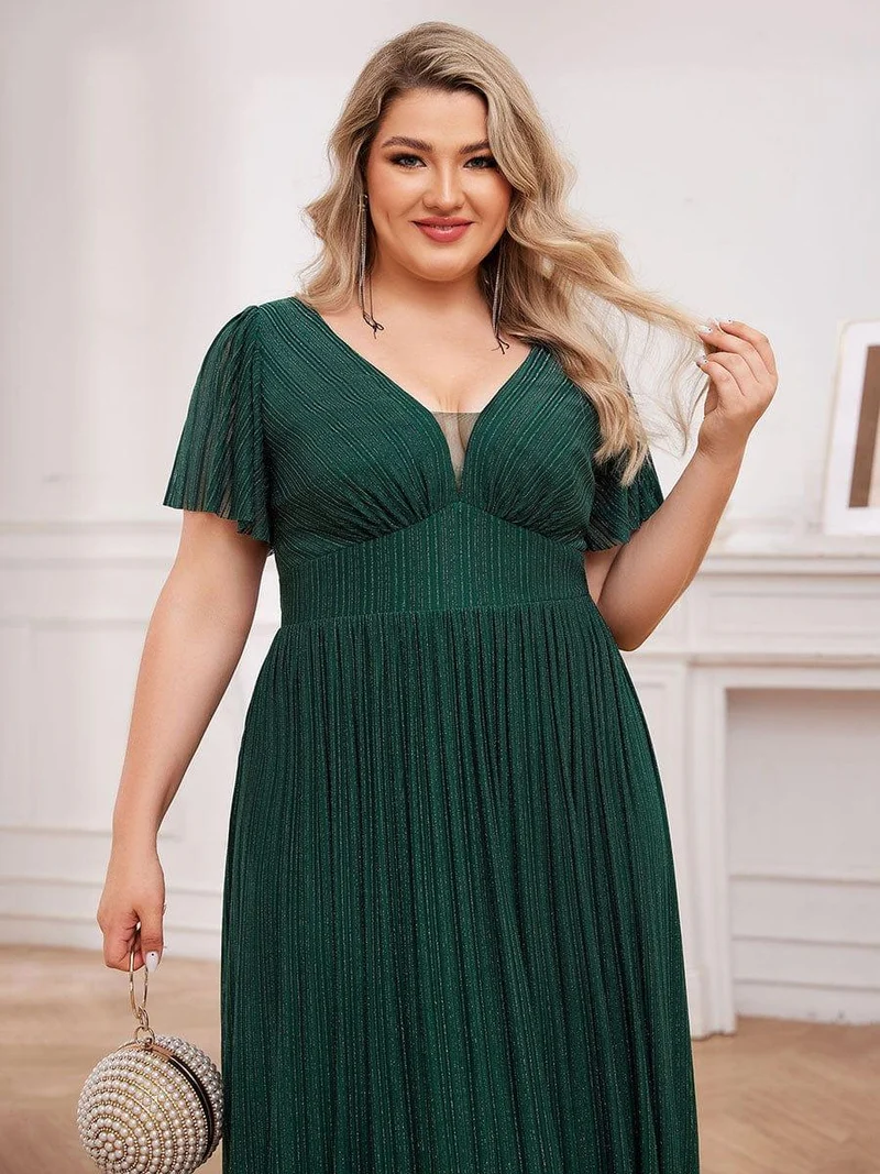 Robe de soirée transparente scintillante col en V taille empire manches courtes