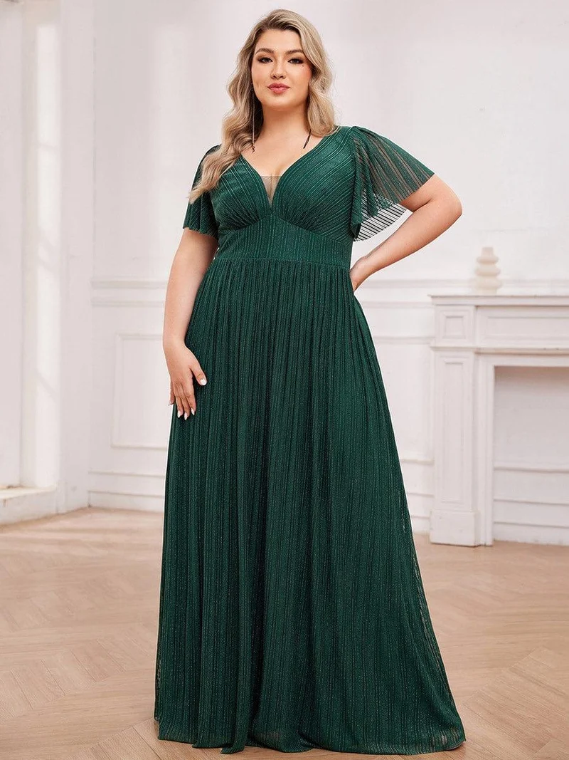 Robe de soirée transparente scintillante col en V taille empire manches courtes