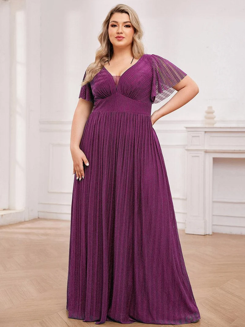 Robe de soirée transparente scintillante col en V taille empire manches courtes