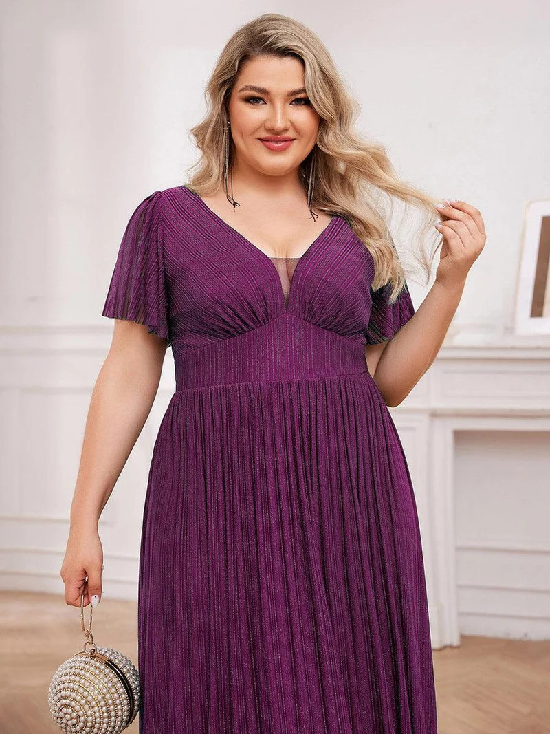 Robe de soirée transparente scintillante col en V taille empire manches courtes