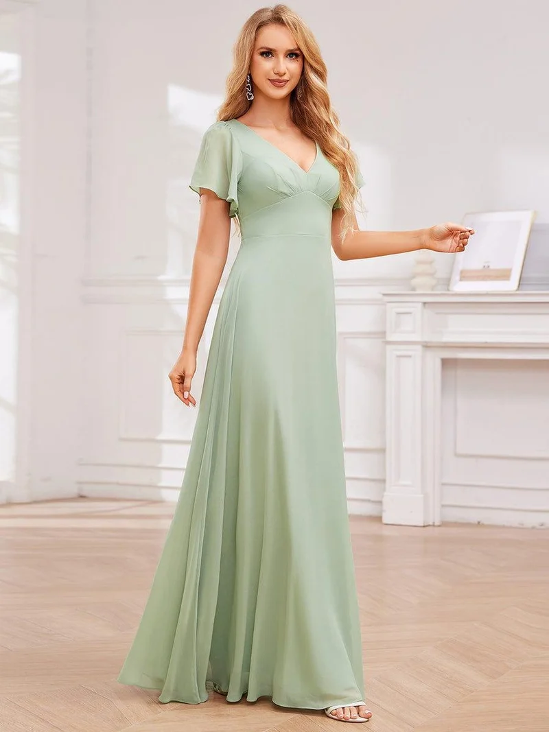 Robe de demoiselle d'honneur plissée trapèze en mousseline de soie avec liens croisés dans le dos et col en V(Vente finale)