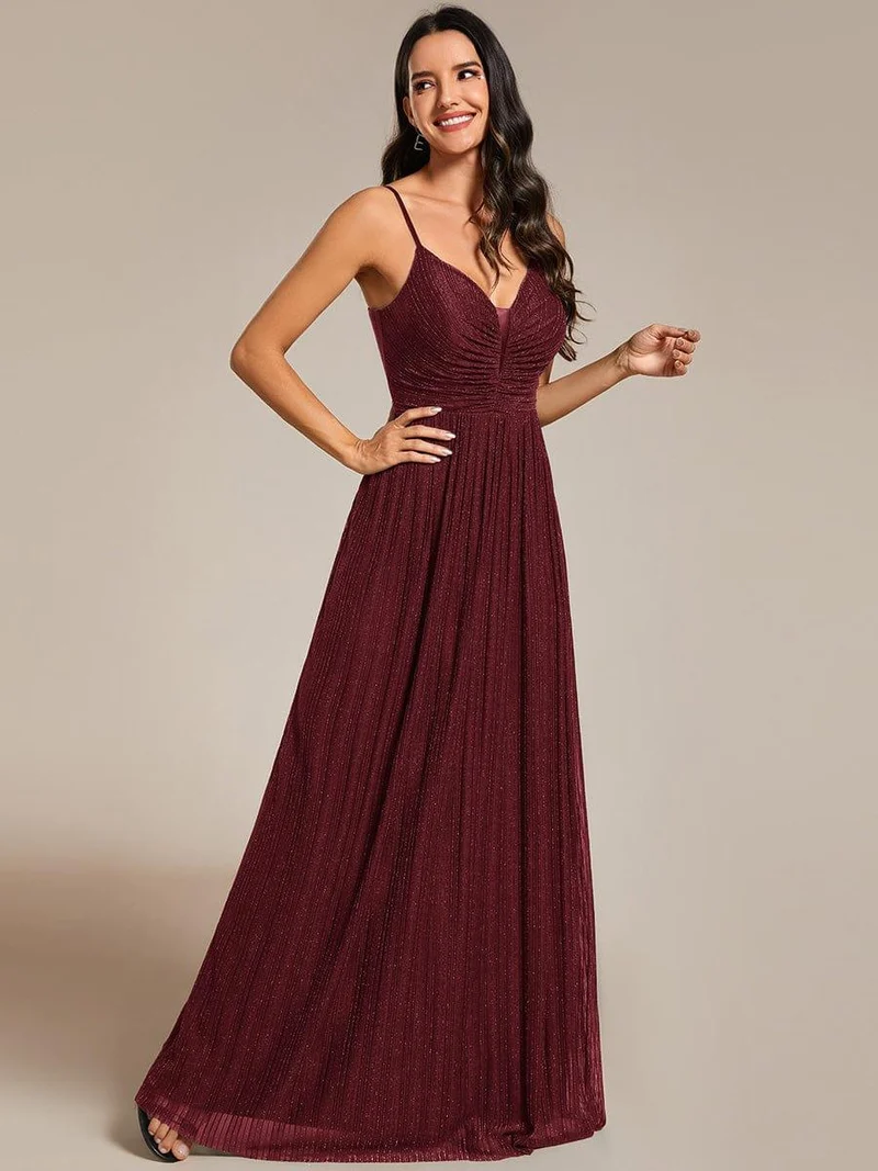 Robe de soirée plissée scintillante à bretelles spaghetti et taille empire