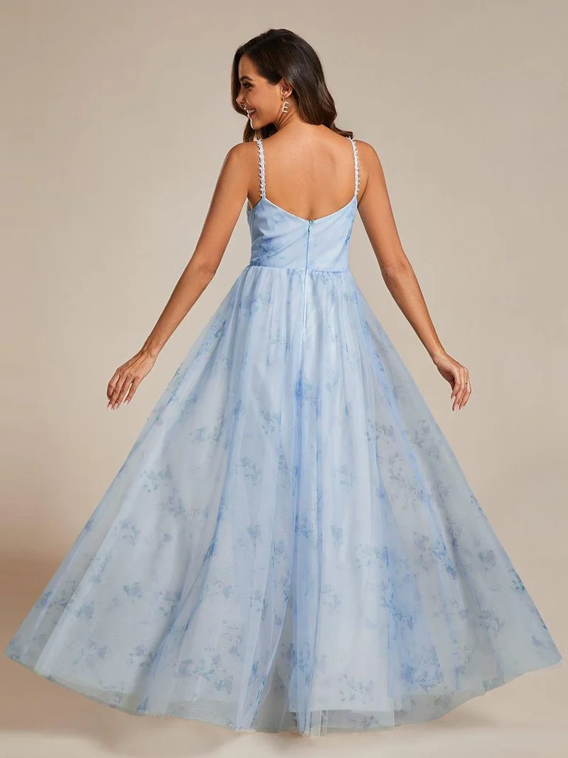 Robe de soirée florale à bretelles spaghetti et taille empire avec col en V