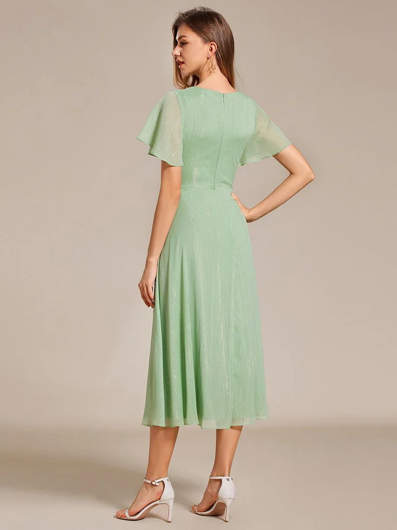 ever OPAHL|Robe d'invité de mariage mi-longue trapèze à manches courtes et paillettes avec ourlet à volants
