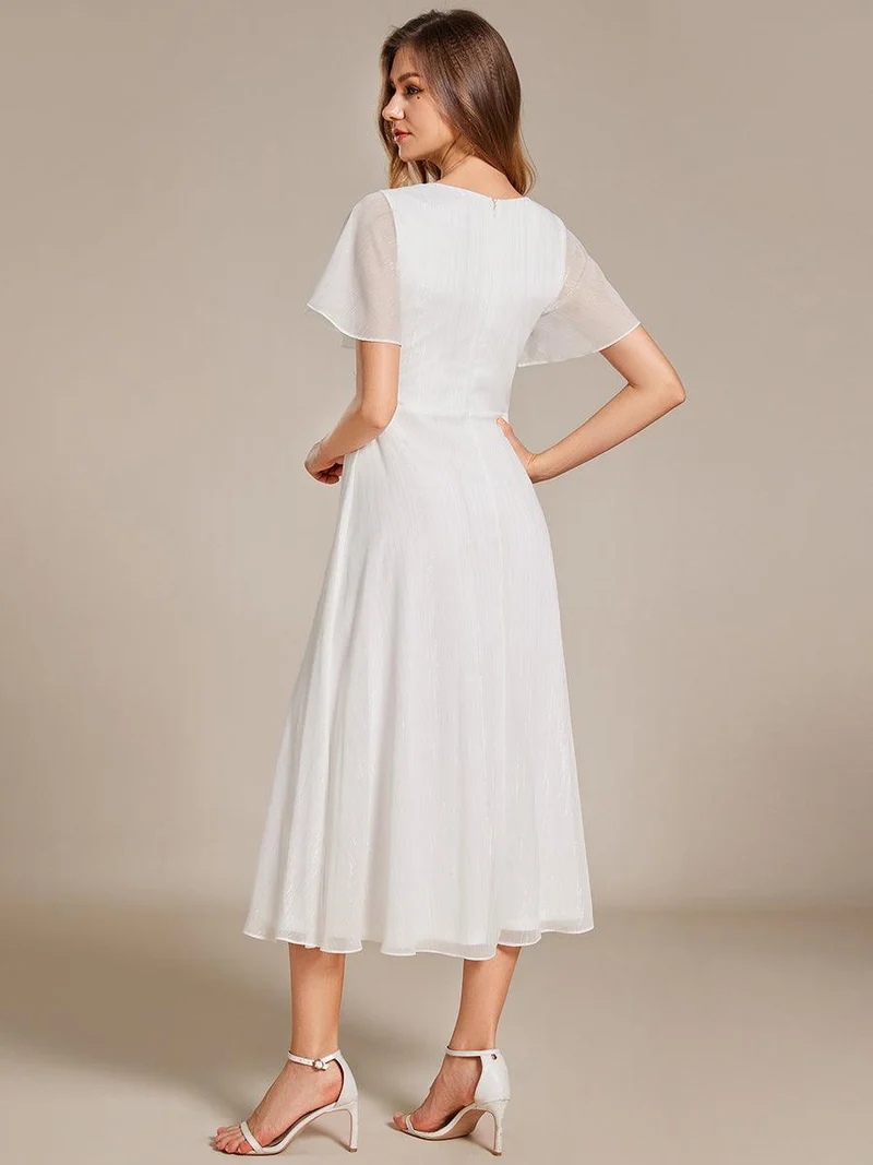 ever OPAHL|Robe d'invité de mariage mi-longue trapèze à manches courtes et paillettes avec ourlet à volants