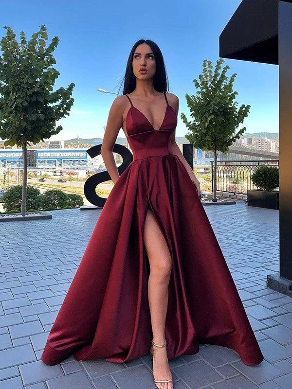 Robe de bal élégante à col en V avec fente haute, poches et jupe trapèze fluide