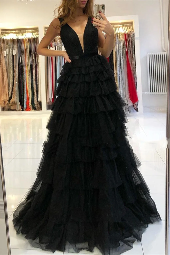 Robe de soirée élégante sans manches à col en V et jupe fluide à volants