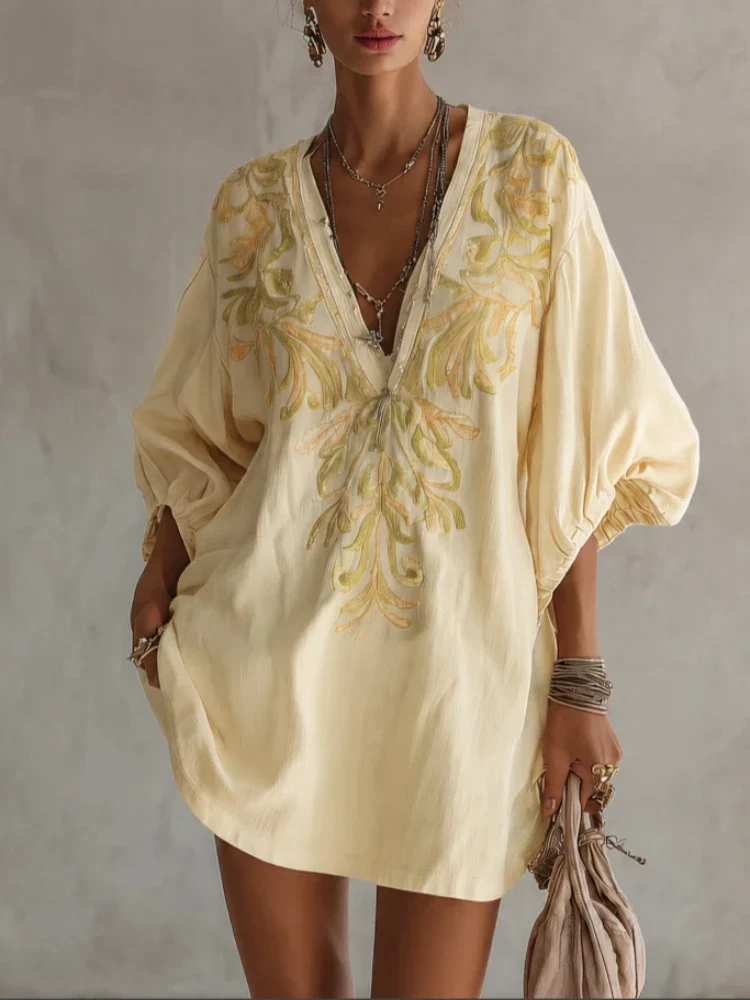 Robe à manches lanternes et broderie