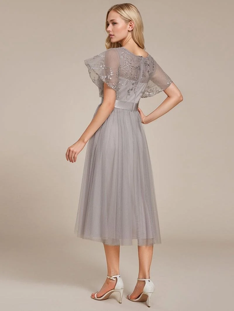 Robe de soirée de mariage grise haut tulle et broderies