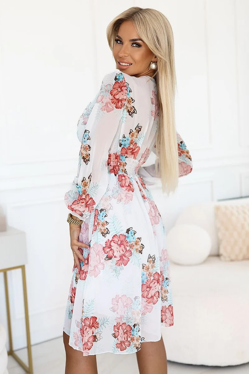 Robe de cocktail fleurie manches longues chic
