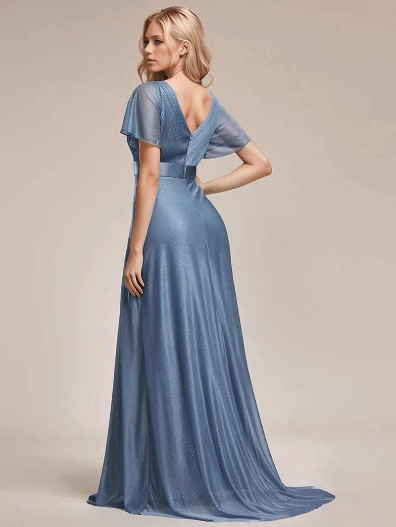 Robe de soirée bleue longue à volants et décolleté plongeant