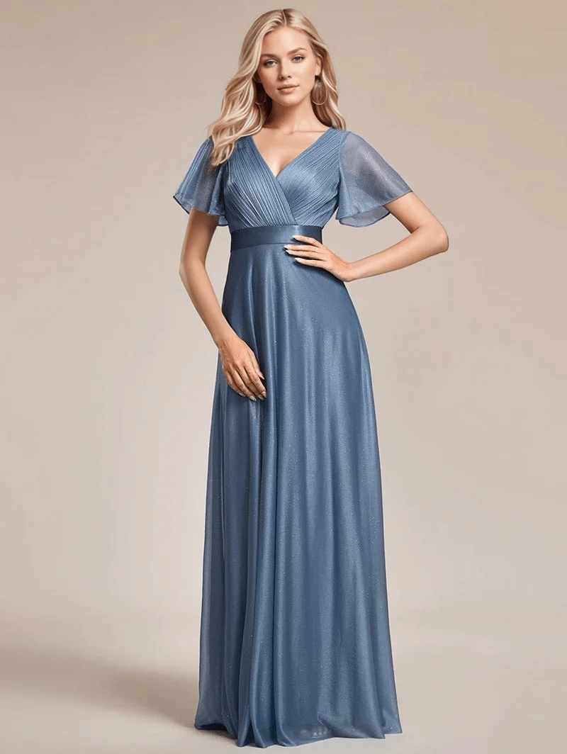 Robe de soirée bleue longue à volants et décolleté plongeant