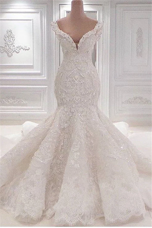 Robe de mariée sirène élégante, col en V, volantée, longueur au sol, avec de magnifiques appliques en dentelle