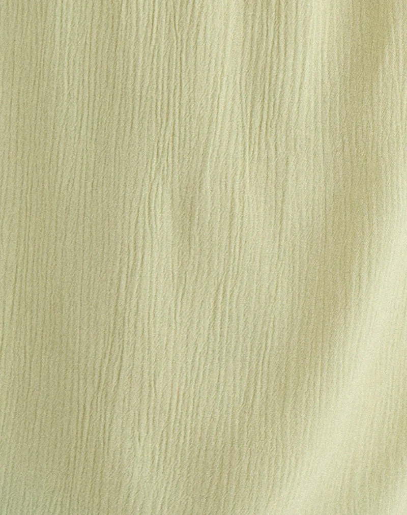 Haut Merisso à encolure rond et découpe en forme de trou de serrure, couleur pistache froissée