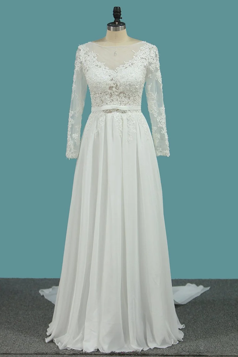 Robe de mariée élégante en mousseline de soie à manches longues et volants raffinés