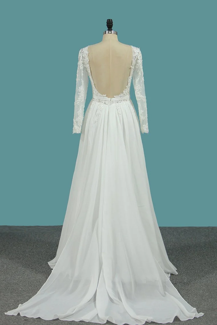 Robe de mariée élégante en mousseline de soie à manches longues et volants raffinés