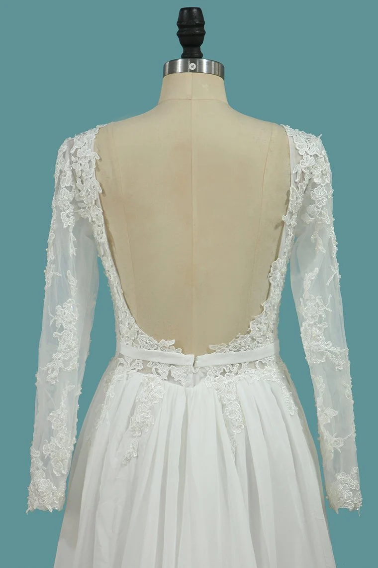 Robe de mariée élégante en mousseline de soie à manches longues et volants raffinés