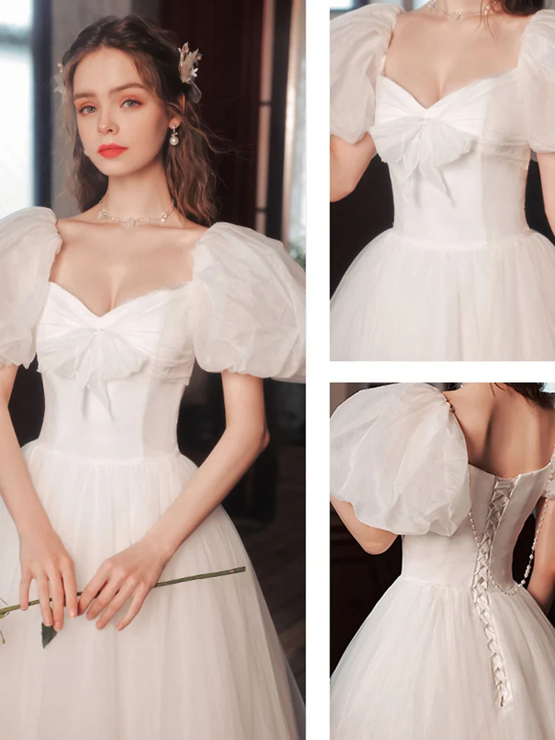 Robe de bal longue en tulle blanc à manches bouffantes, idéale pour les 16 ans