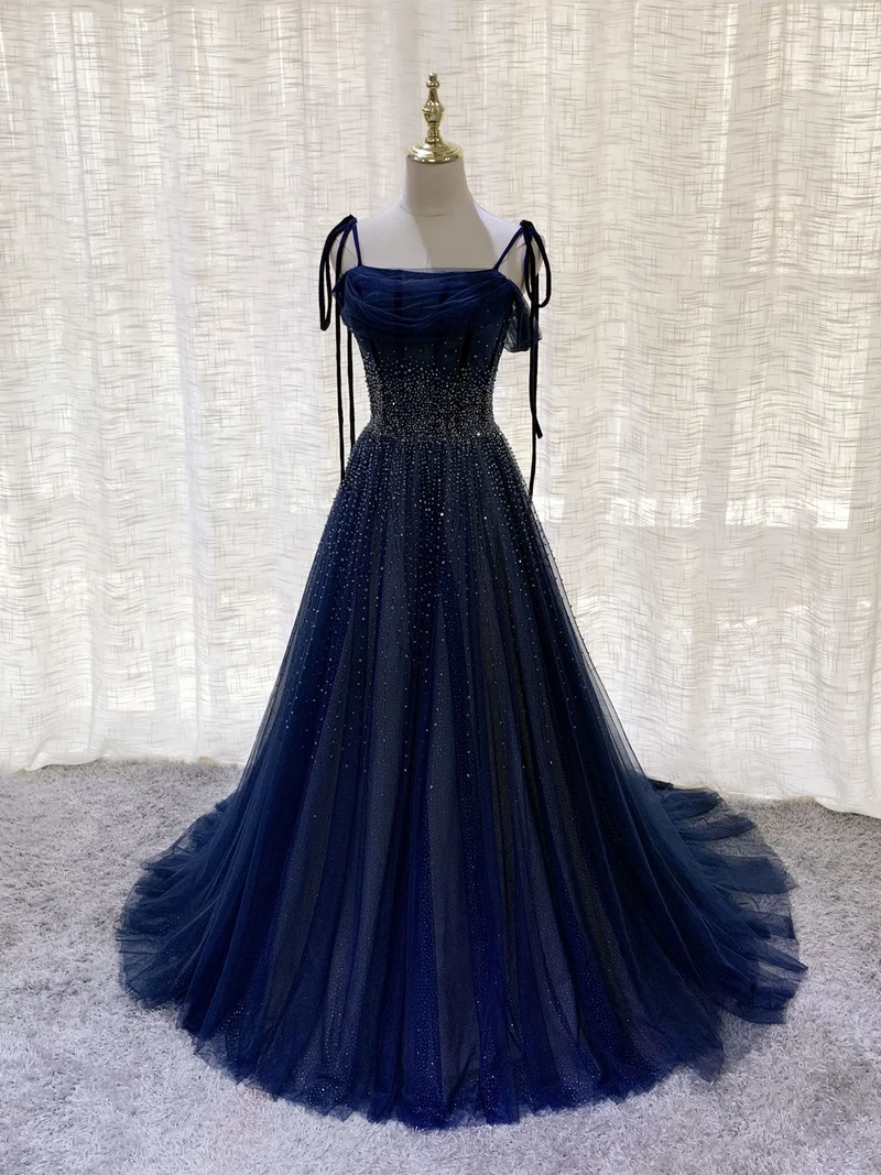 Superbe robe de soirée longue en tulle bleu foncé à paillettes