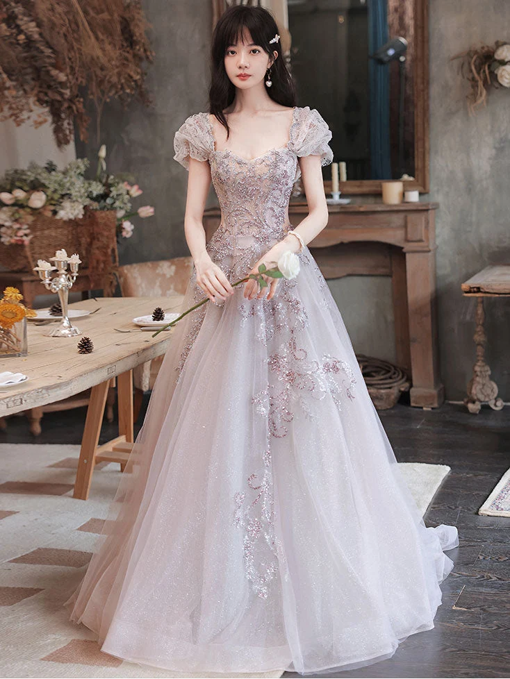 Robe de bal longue élégante en tulle à paillettes et perles