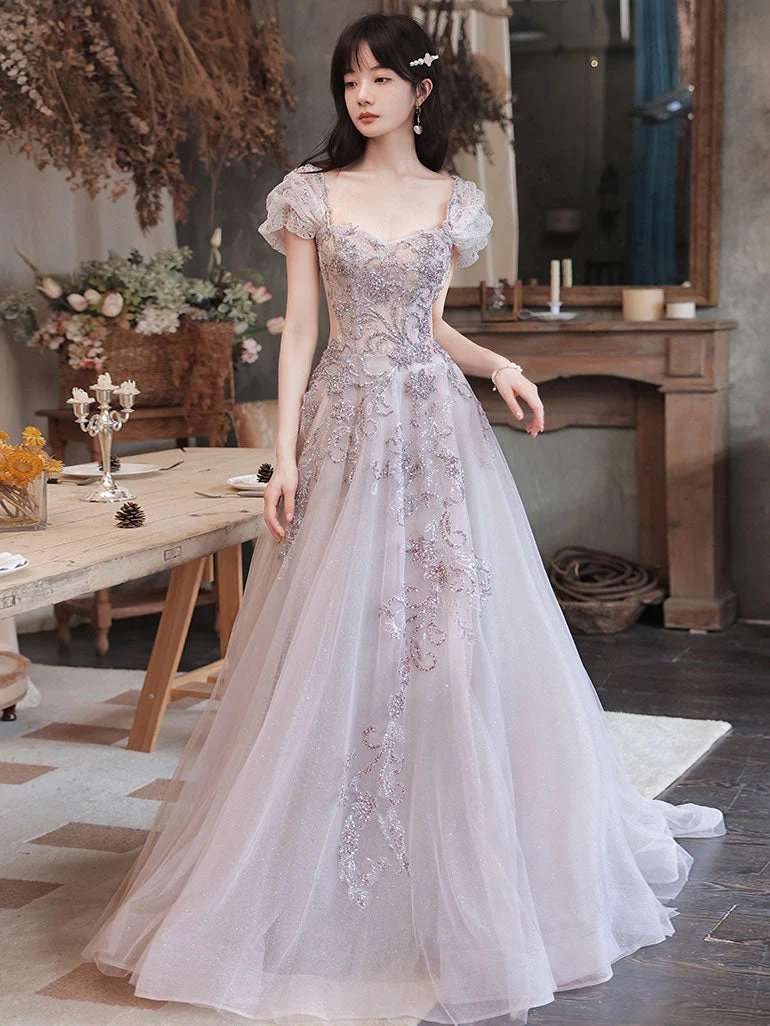 Robe de bal longue élégante en tulle à paillettes et perles