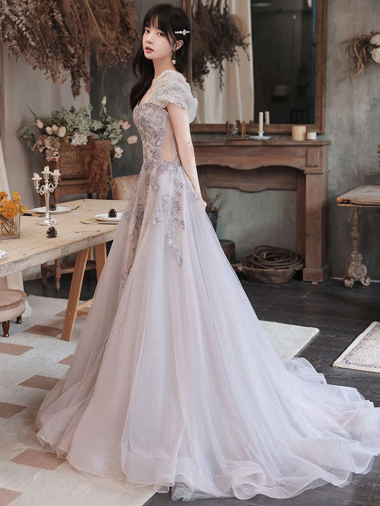 Robe de bal longue élégante en tulle à paillettes et perles