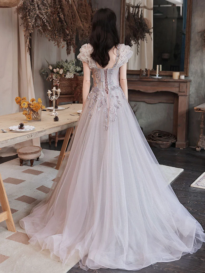 Robe de bal longue élégante en tulle à paillettes et perles