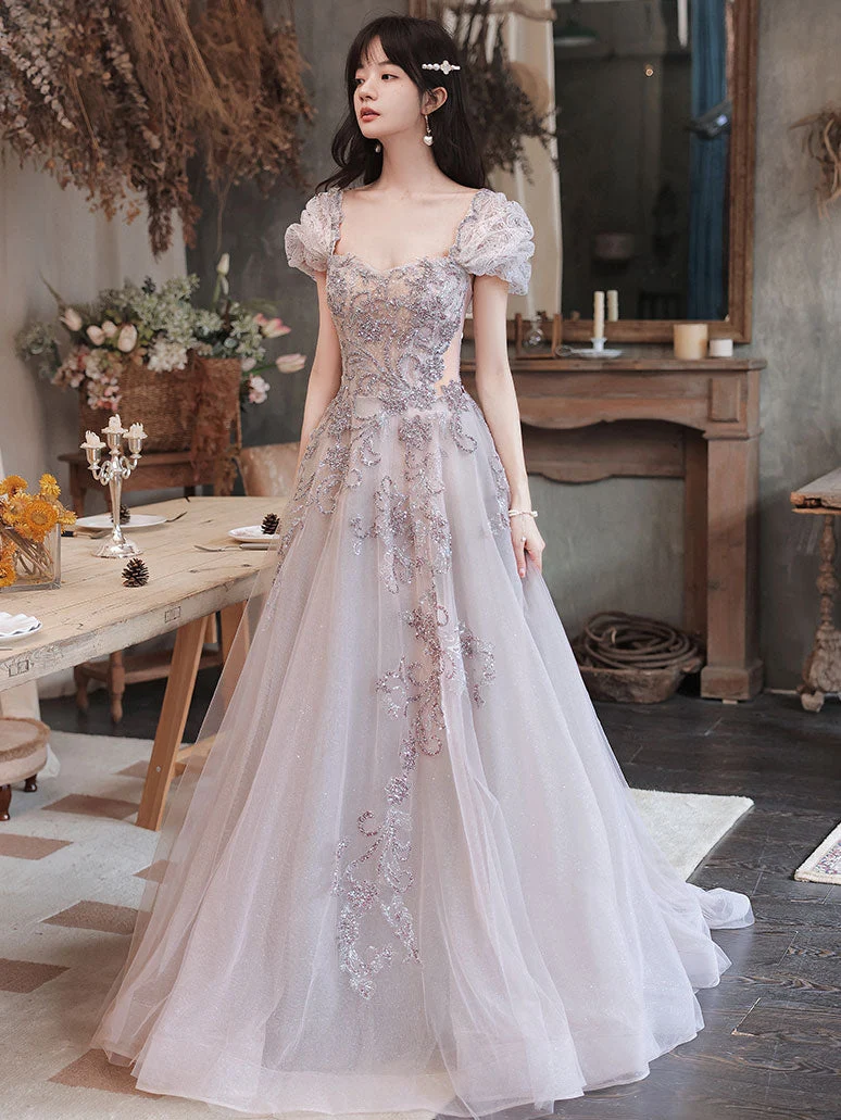 Robe de bal longue élégante en tulle à paillettes et perles