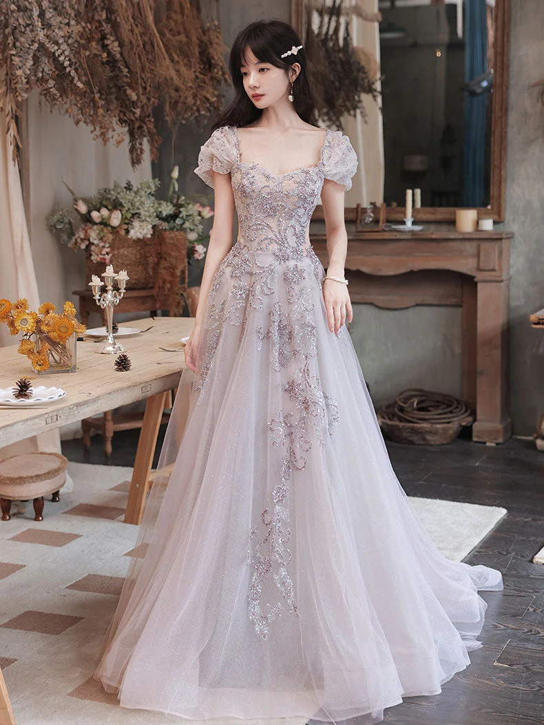 Robe de bal longue élégante en tulle à paillettes et perles