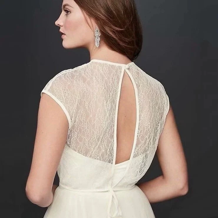 Lena Robe de mariée en dentelle à manches courtes et dos ouvert