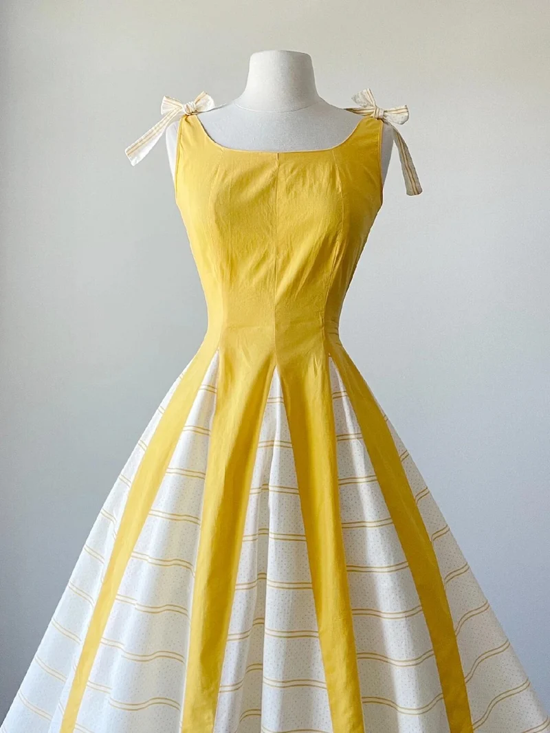 Nouvelle arrivée des années 50, robe vintage à col bateau jaune avec jupe circulaire complète