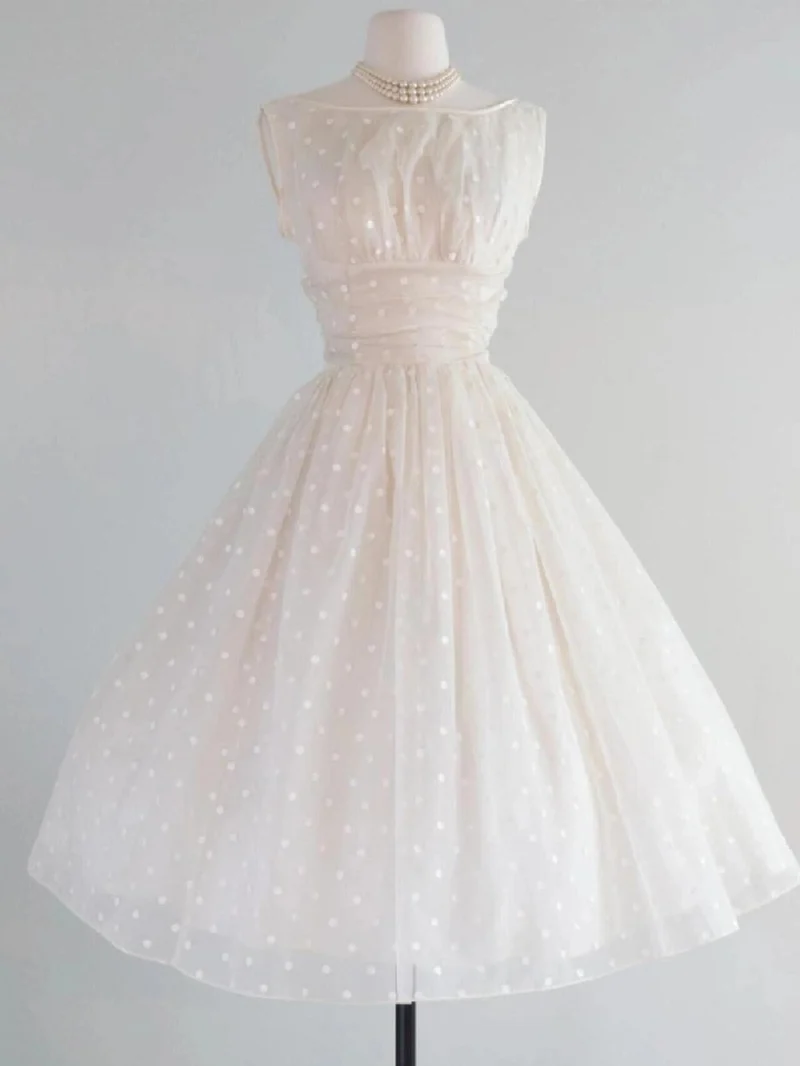 Robe de mariée courte vintage à pois et col bateau