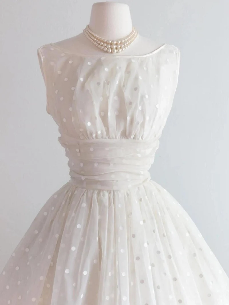 Robe de mariée courte vintage à pois et col bateau
