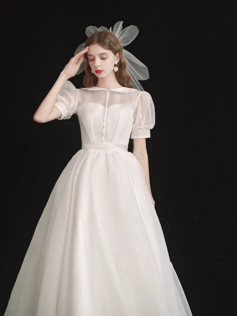 Robe de mariée modeste en organza longueur thé années 50 avec manches courtes
