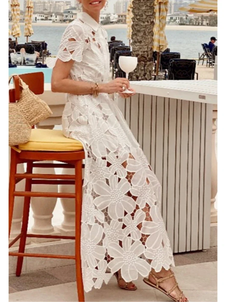 Robe élégante blanche broderie