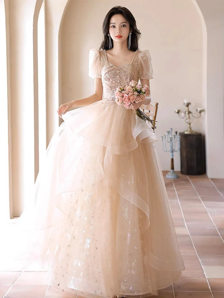 Robe de bal princesse avec jupe à volants et champagne clair