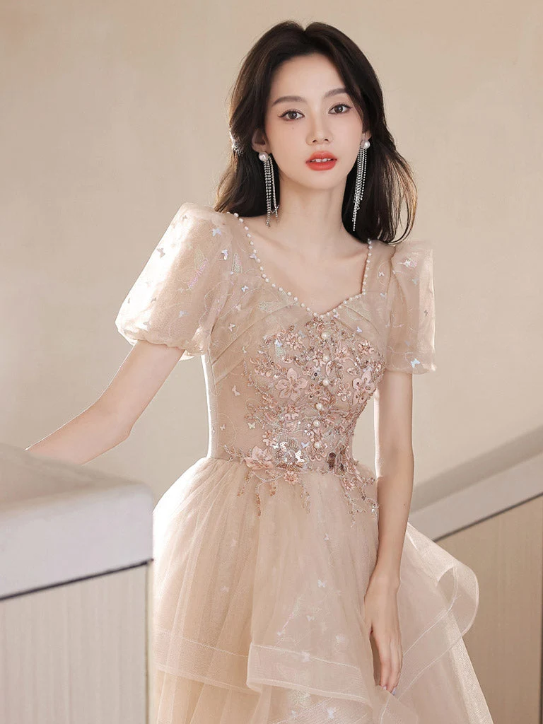 Robe de bal princesse avec jupe à volants et champagne clair