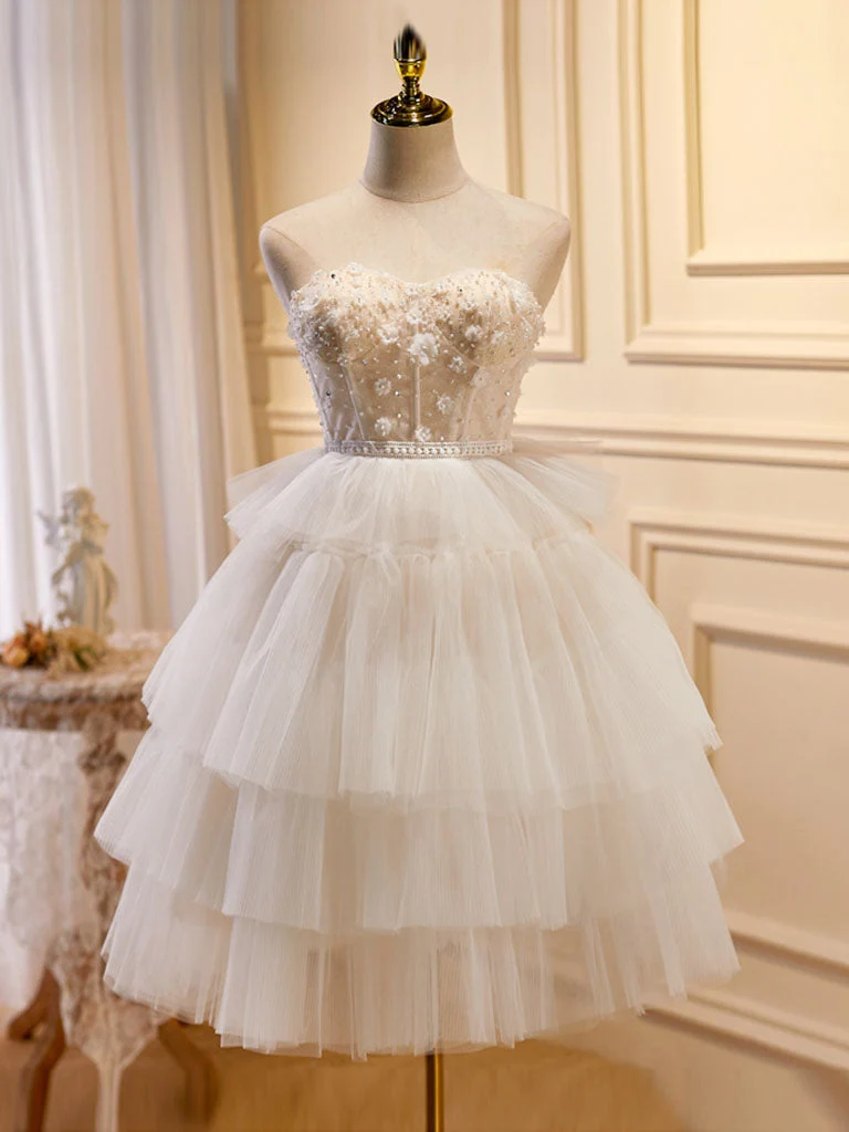 Jolie robe de soirée en tulle transparent sans bretelles blanche