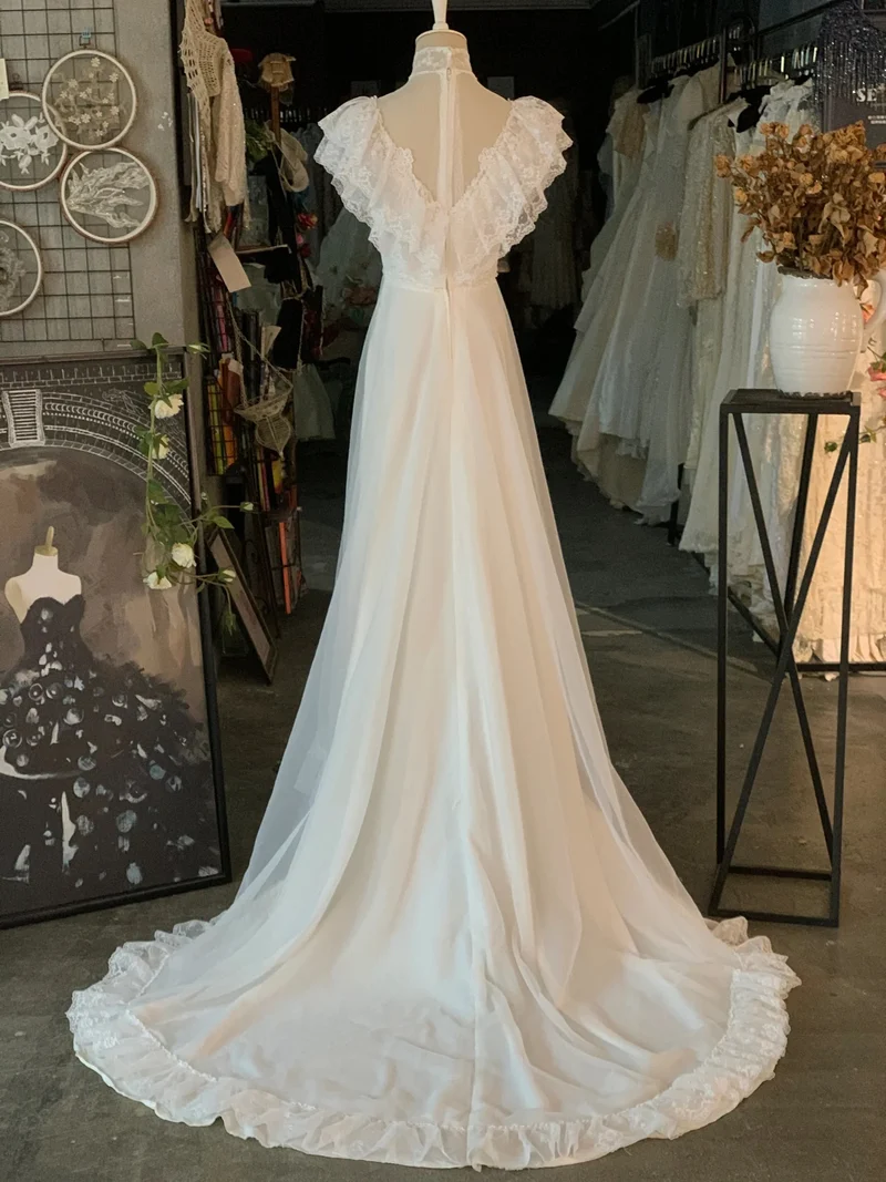 Robe de mariée vintage en dentelle et mousseline à manches longues