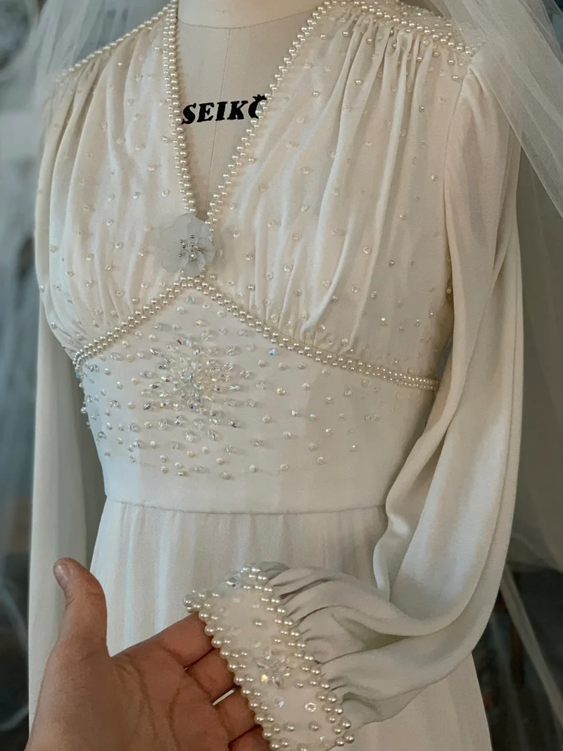 Robe de mariée vintage modeste à manches longues des années 70