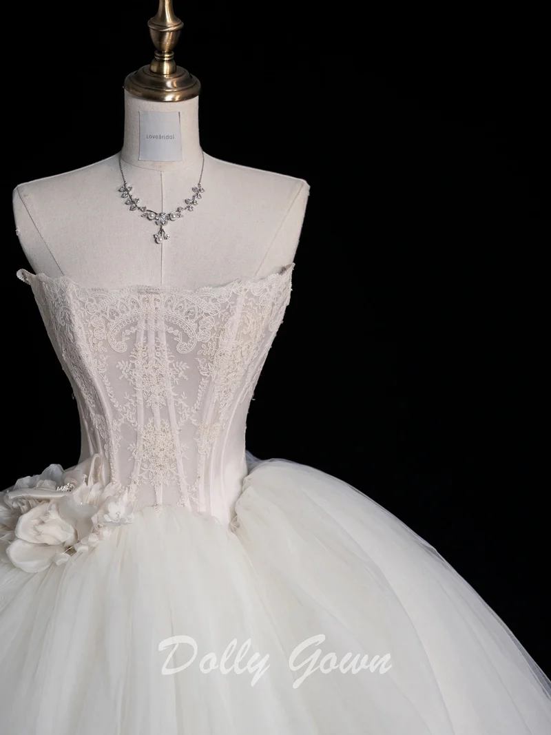 Robe de mariée princesse sans bretelles avec corset transparent et robe de bal