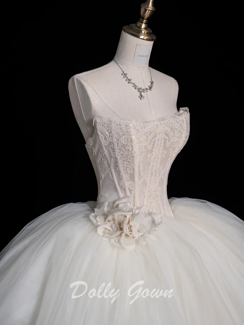 Robe de mariée princesse sans bretelles avec corset transparent et robe de bal