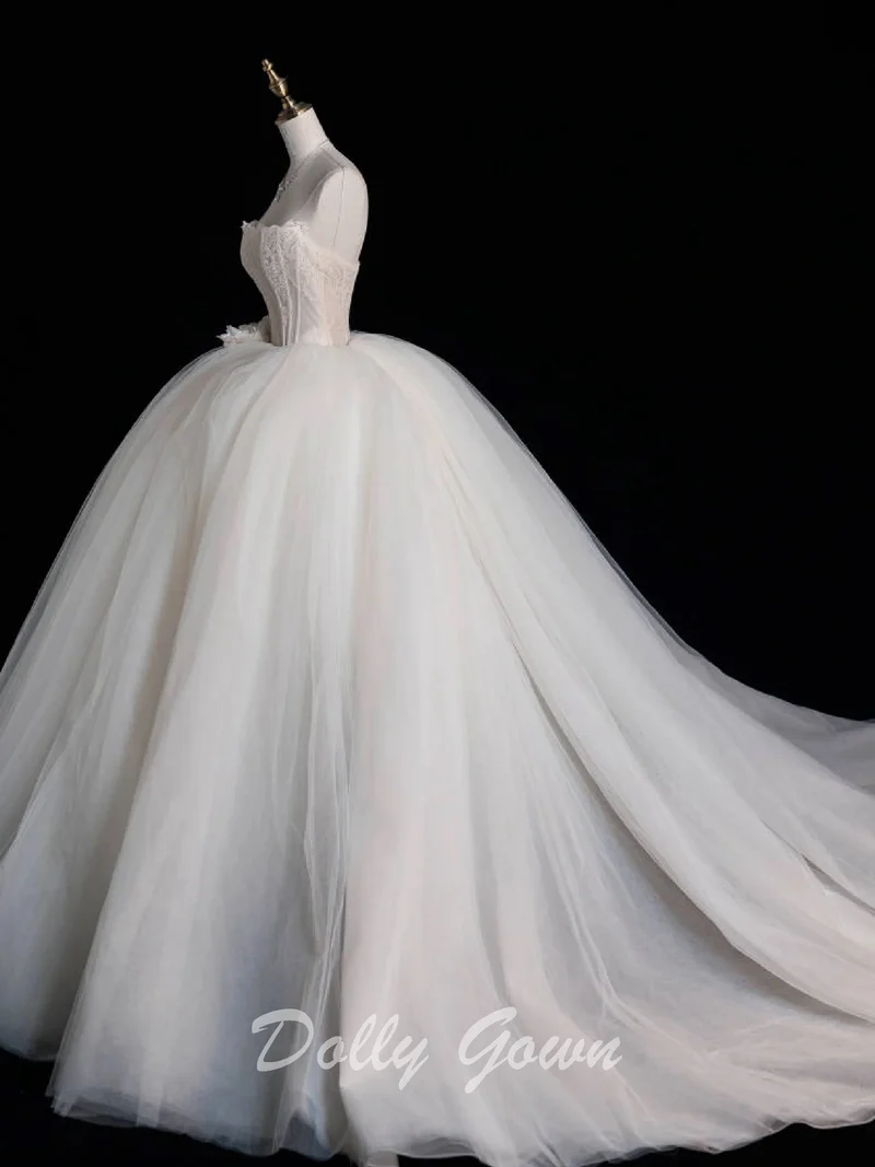 Robe de mariée princesse sans bretelles avec corset transparent et robe de bal
