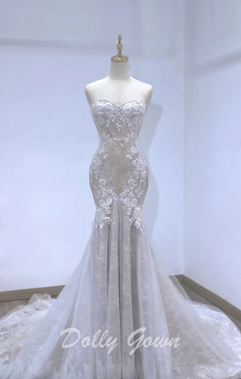 Robe de mariée sirène en dentelle à couper le souffle sans bretelles Illusion
