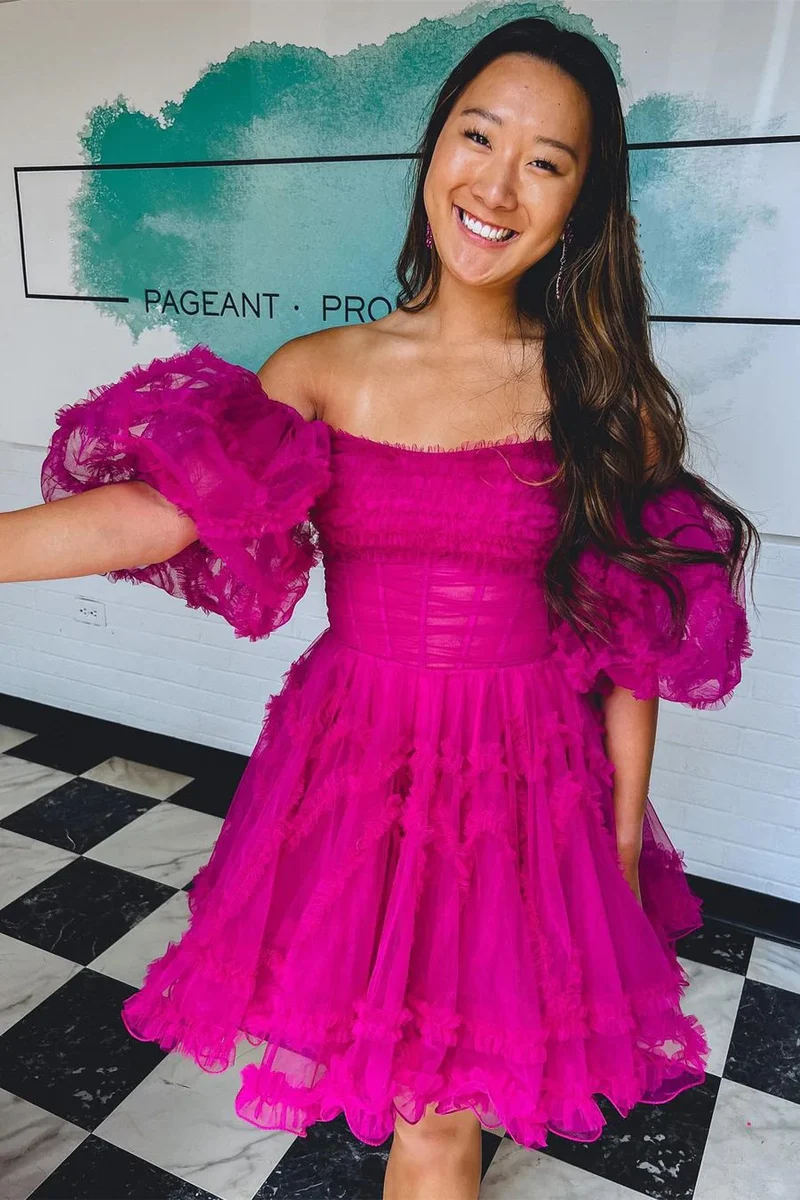 Robe de soirée à volants et épaules dénudées rose fuchsia